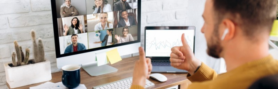 Video conference. Business partners communicate via video using laptop. The guy talks with his business partners appearance about plans and strategy. Distant work