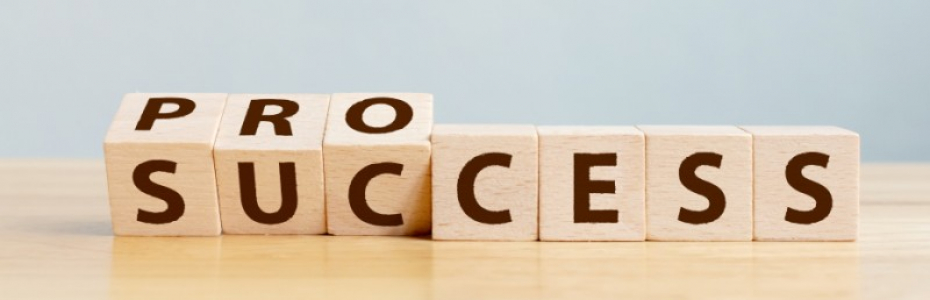 Process for success concept. Wooden cube block flip over word process to success on wood table
